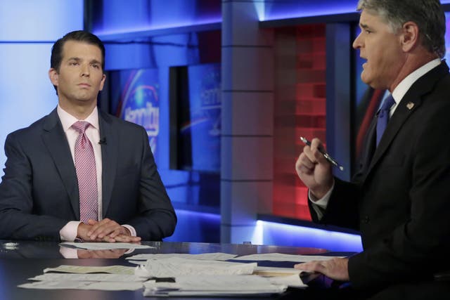 Donald Trump Jr is interviewed by host Sean Hannity on his Fox News Channel television programme in New York