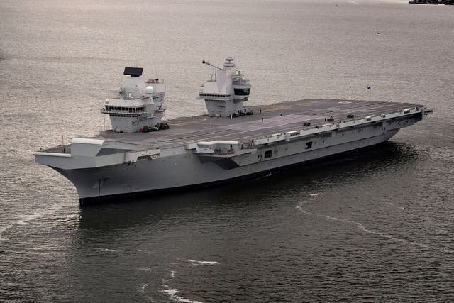 HMS Queen Elizabeth, one of two new aircraft carriers for the Royal Navy, leaving the Rosyth dockyard near Edinburgh to begin her sea worthiness trials on 26 June