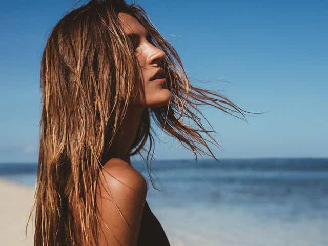 You wouldn’t hit the beach without sunscreen on your skin so why treat your hair any different?