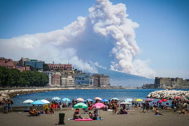 Huge clouds of smoke drift over Naples from fires on Mount Vesuvius