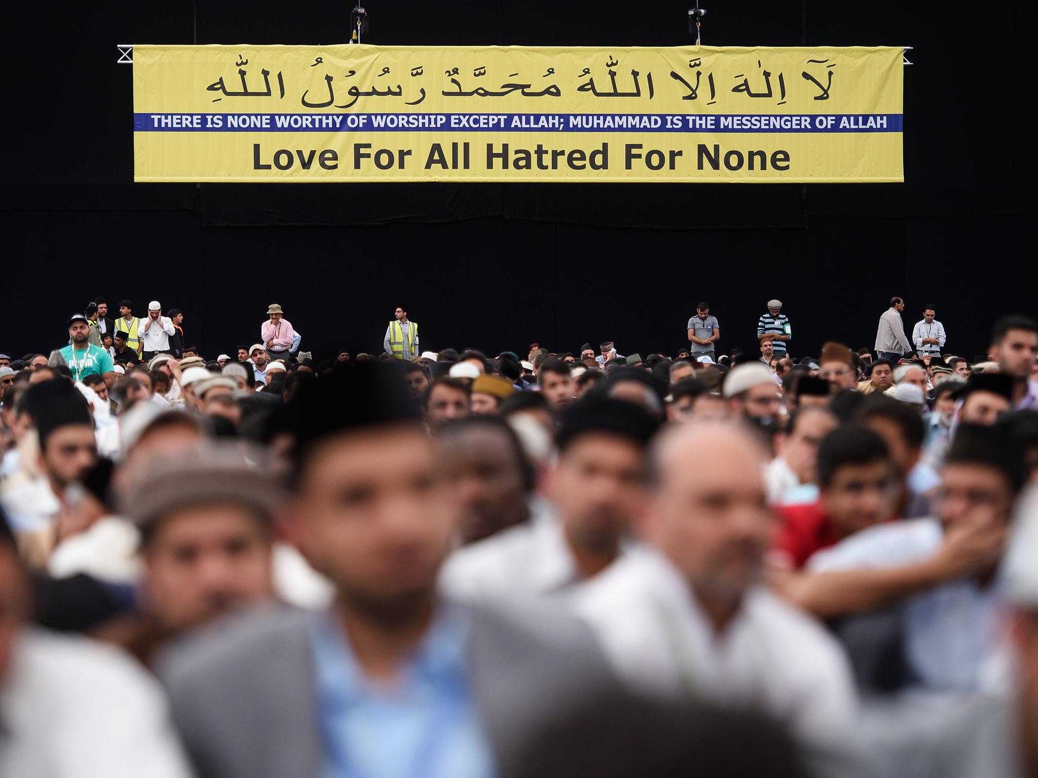 Members of the Ahmadiyya Muslim community prepare to listen to a speech by during an annual three-day event, known as the Jalsa Salana in 2015