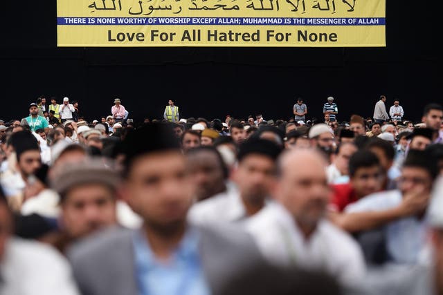 Members of the Ahmadiyya Muslim community prepare to listen to a speech by during an annual three-day event, known as the Jalsa Salana in 2015