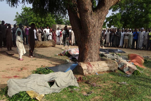 People gather to mourn the deaths in Maiduguri