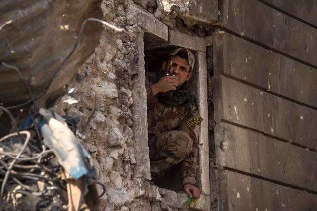 A member of the Iraqi forces is seen in the Old City of Mosul on July 10, 2017, during the offensive to retake the embattled city from Islamic State (IS) group fighters.