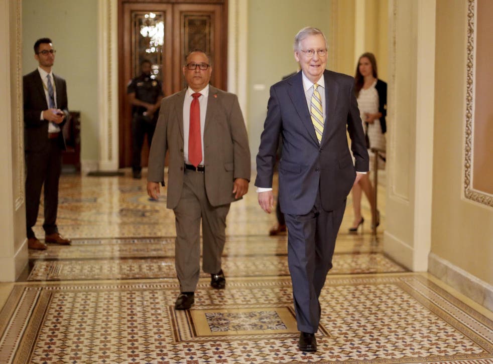 Senate Majority Leader Mitch McConnell walks to his office on Capitol Hill
