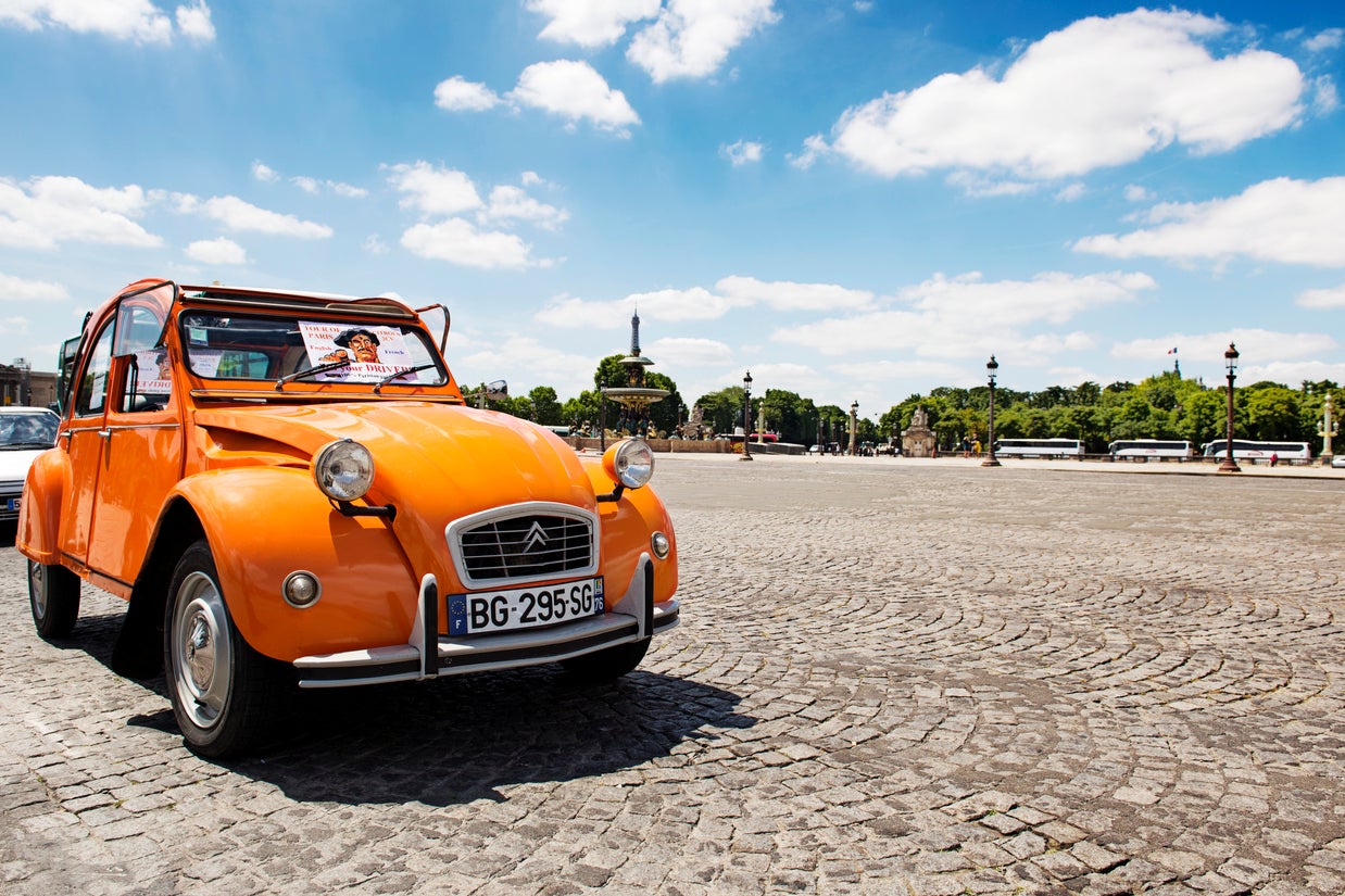 Drive a classic car through the French capital (Getty)