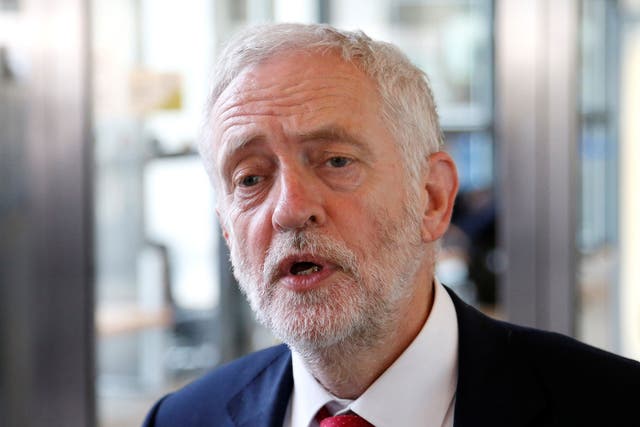 Britain's opposition Labour Party leader Jeremy Corbyn talks to the media in Brussels