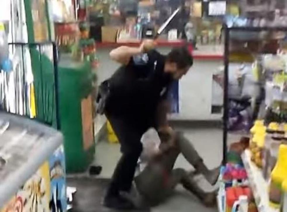 Footage showed the officer striking the woman 12 times within 30 seconds