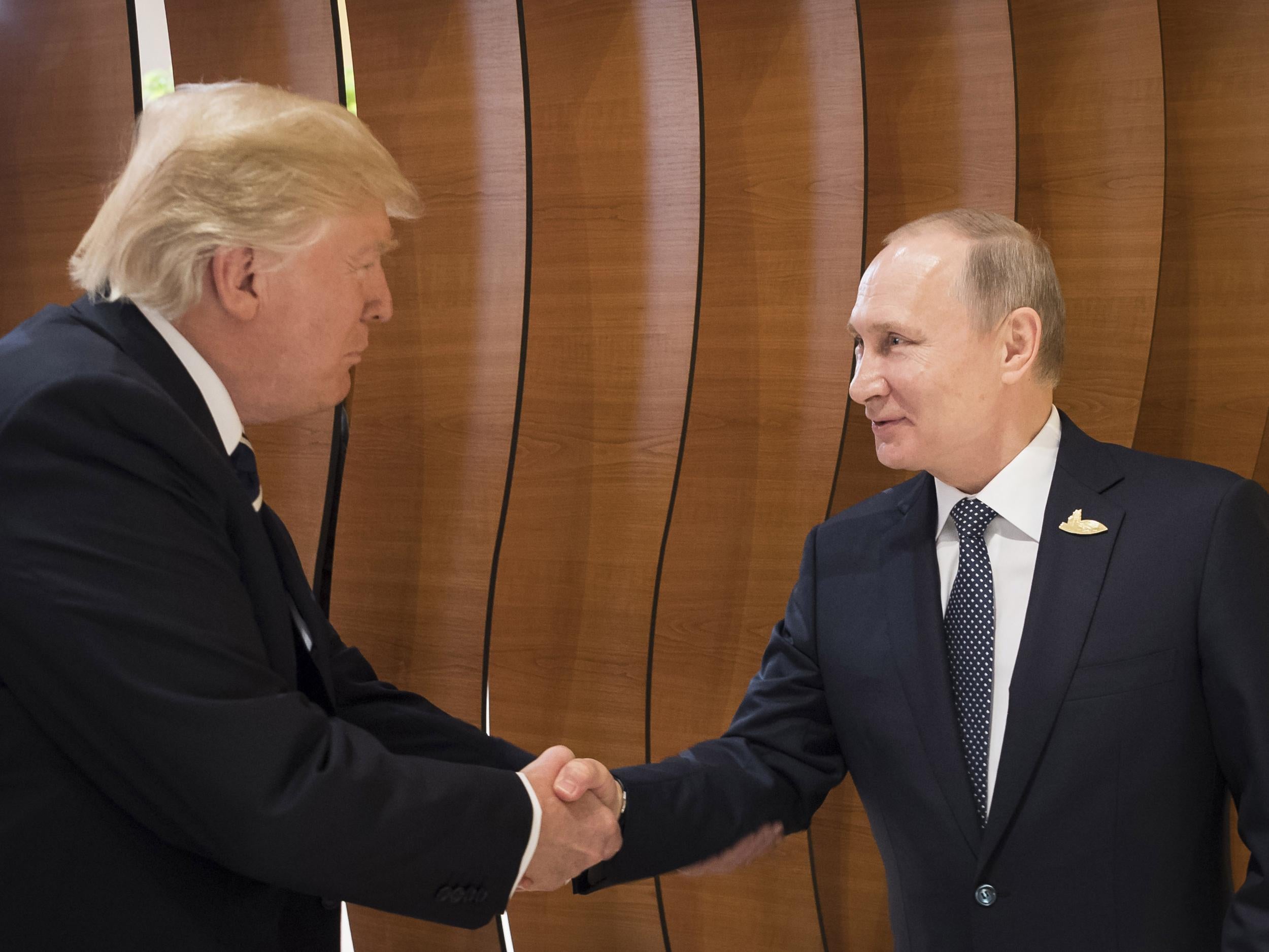 Donald Trump said it was important to 'have dialogue' with Vladimir Putin, because 'we got to solve Syria'