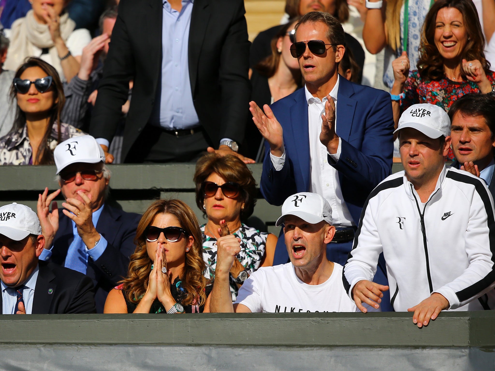 Federer's camp watched on at Centre Court