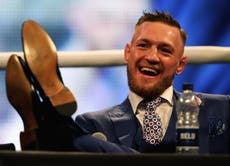 McGregor gets the better of Mayweather as world tour draws to a close