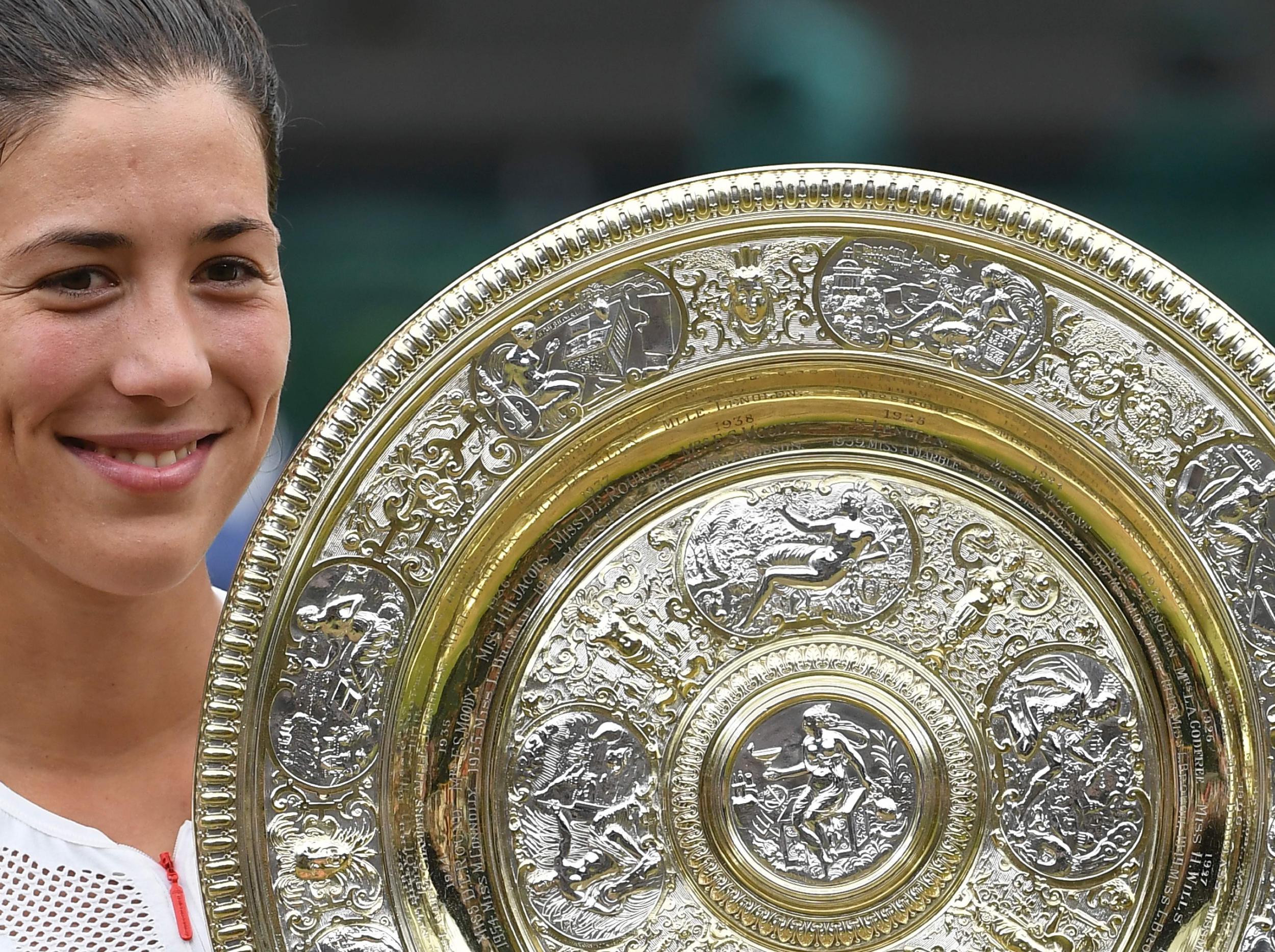 Two of Muguruza's three appearances in Grand Slam finals have at the All England Club