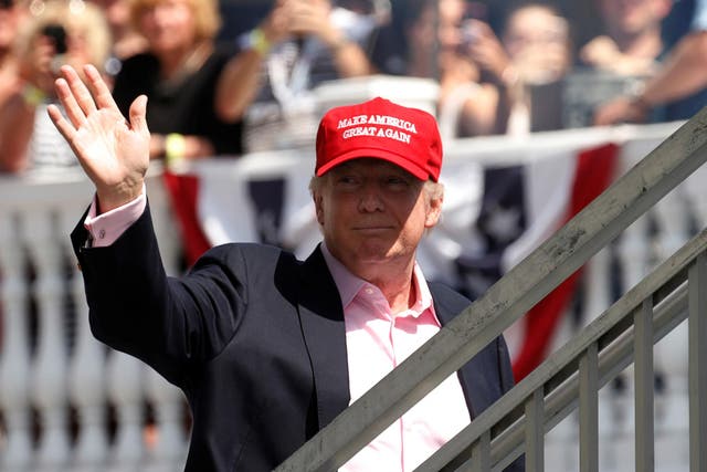 US President Donald Trump waves to supporters