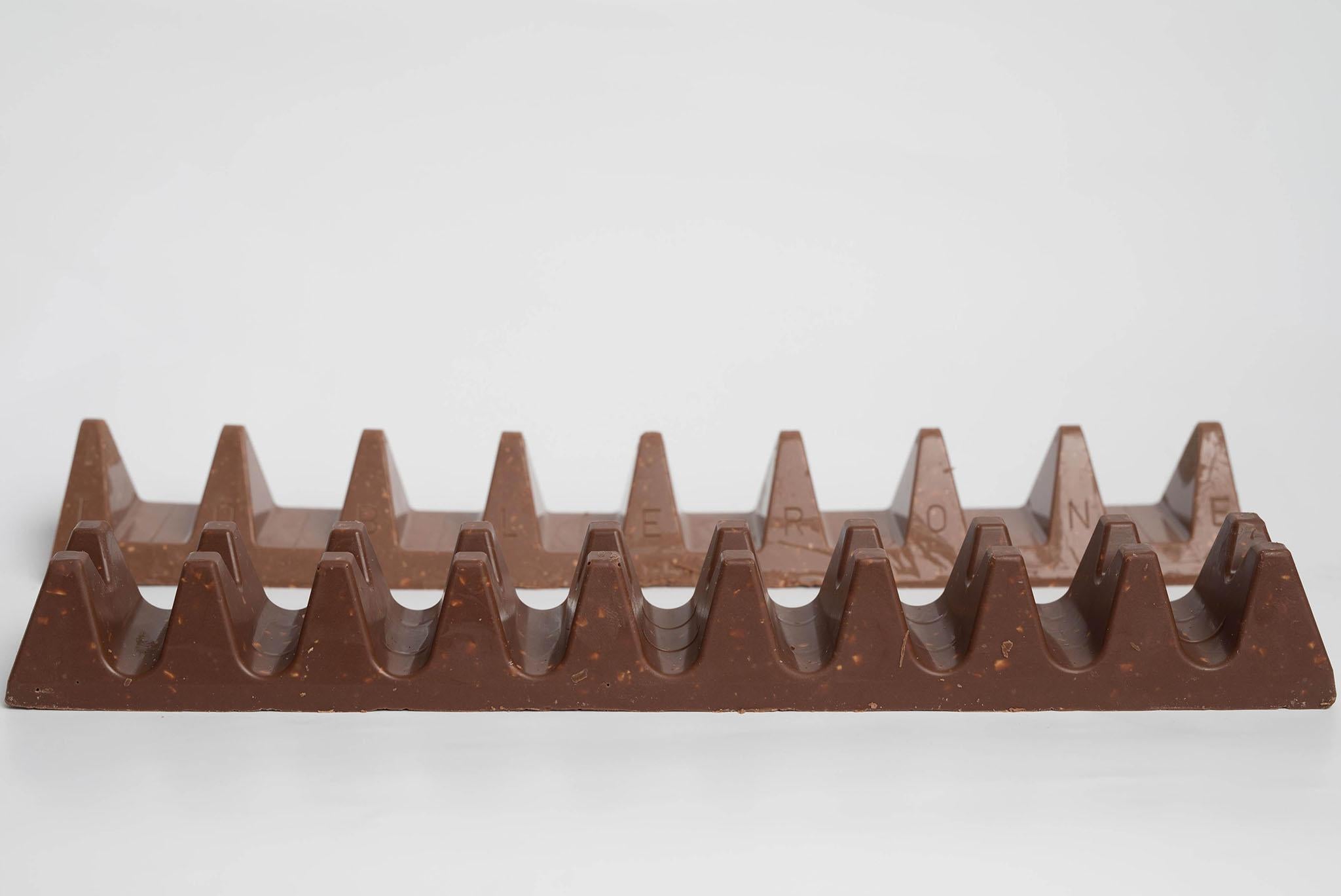 Poundland's Twin Peaks bar (front) launched on the back of Toblerone reducing the number of triangles