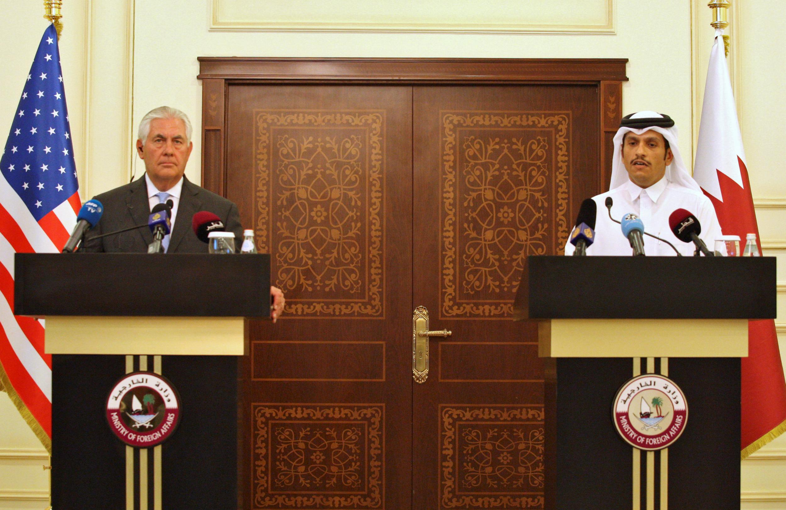 Qatari Foreign Minister Sheikh Mohammed bin Abdulrahman al-Thani (R) and US Secretary of State Rex Tillerson speak at a joint news conference addressing the Gulf diplomatic crisis in Doha on 11 July 2017