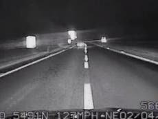 Drunk driver caught on camera piling into police cars at 127 mph