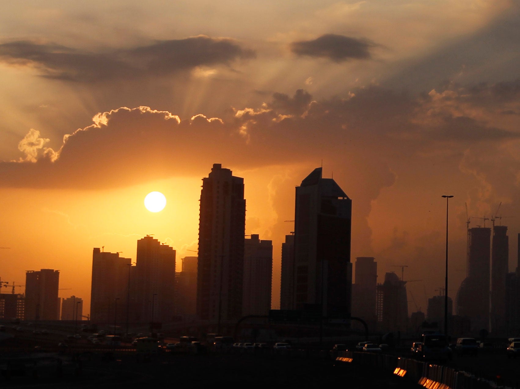 The sun sets over Dubai