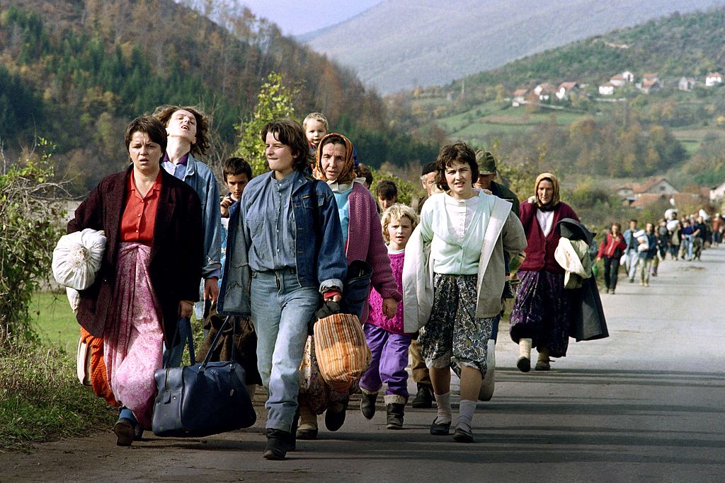 Dispossessed Bosnians make their way to refugee centres in 1992, fleeing persecution and abuse