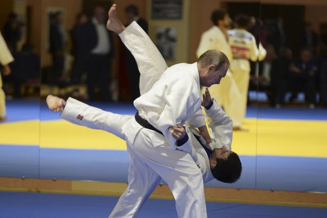 Vladimir Putin takes part in a training session with members of the Russian national judo team in Sochi on 8 January 2016