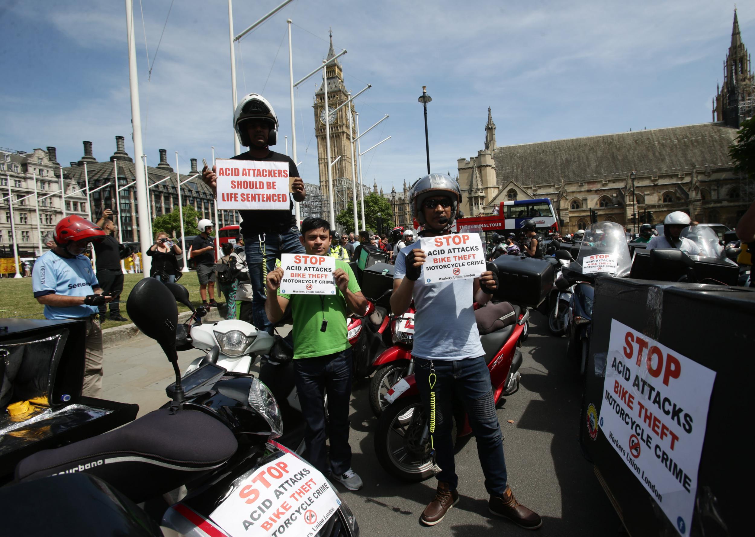 Delivery riders during a demonstration in Parliament Square on 18 July