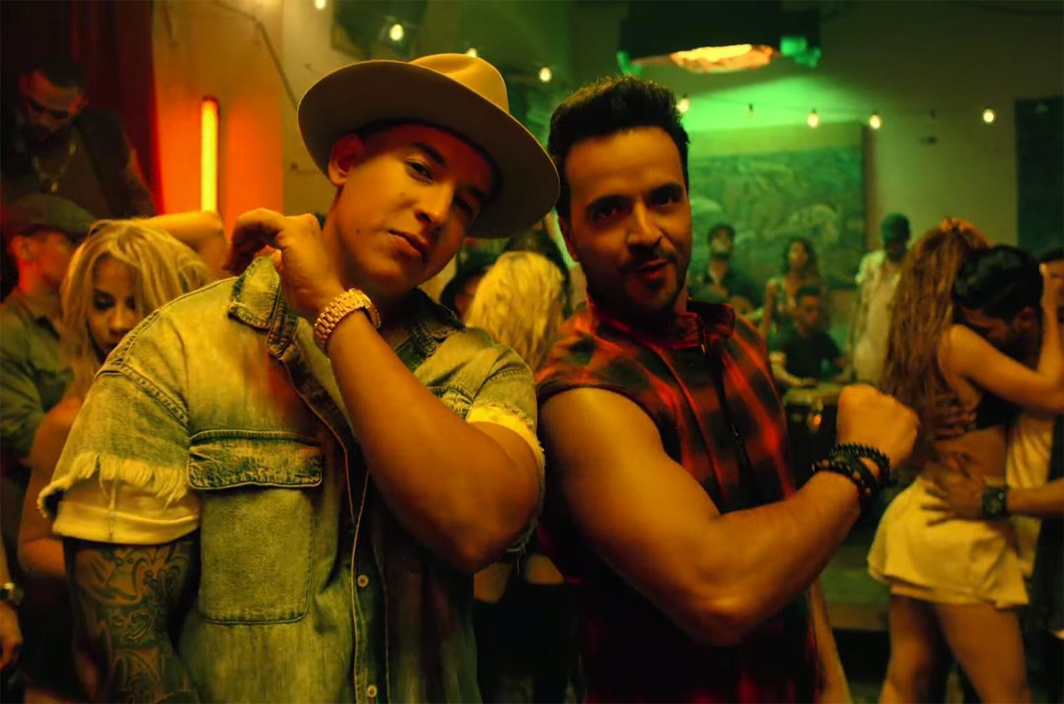 The title of the song by Daddy Yankee (left) and Luis Fonsi translates to ‘Slowly’