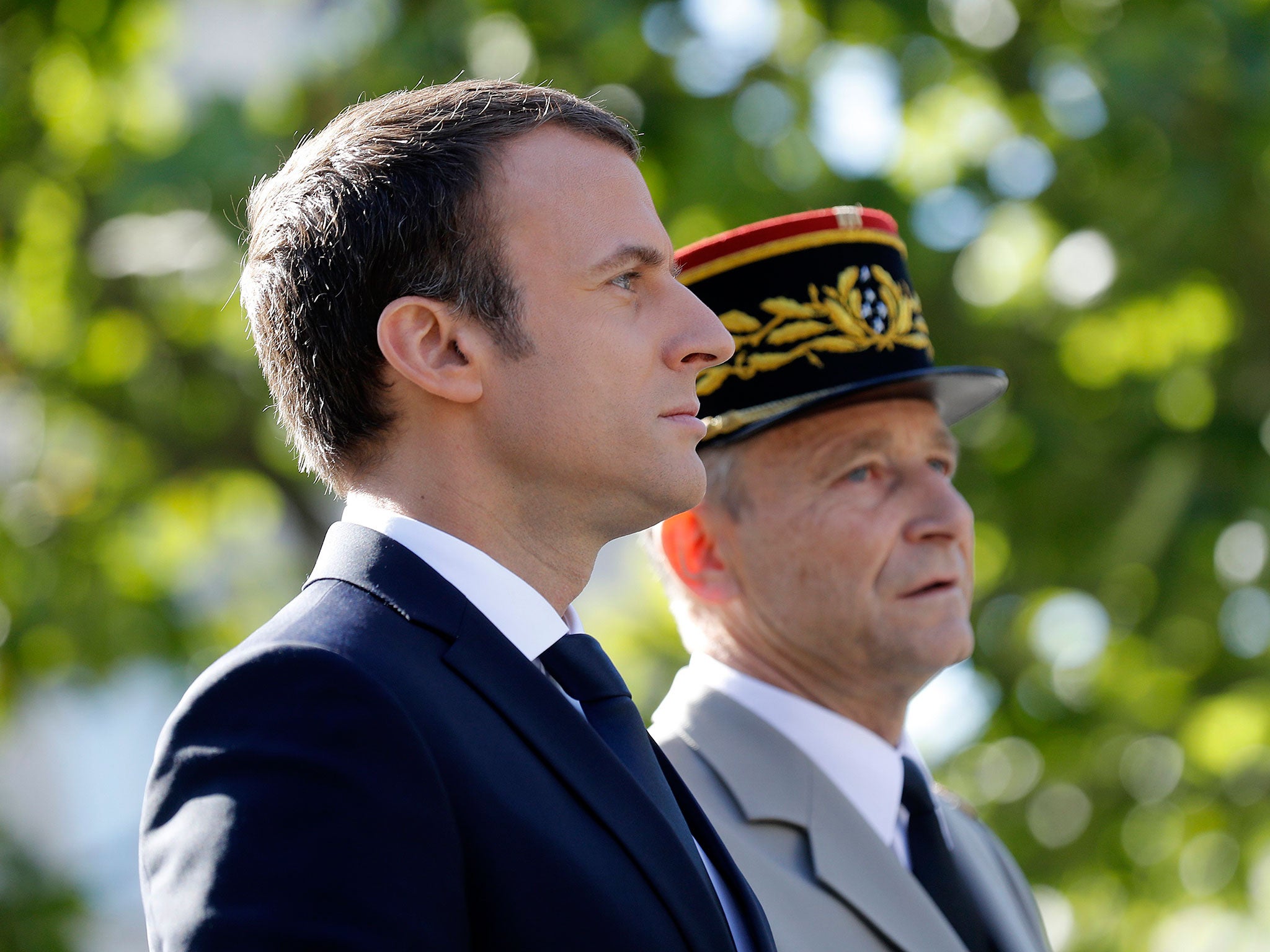 Emmanuel Macron with his chief of defence staff General Pierre de Villiers at the Bastille Day parade in Paris last week. De Villiers resigned days later