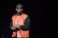 R Kelly manager accused of threatening alleged victim’s parents