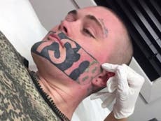 Man with 'DEVAST8' tattoo across his face accepts job offer