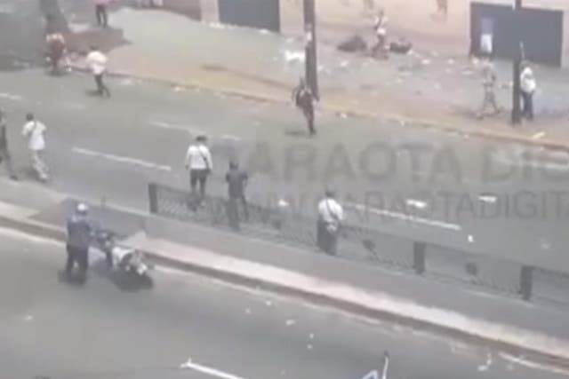 Activists open fire on voters in Caracas, Venezuela