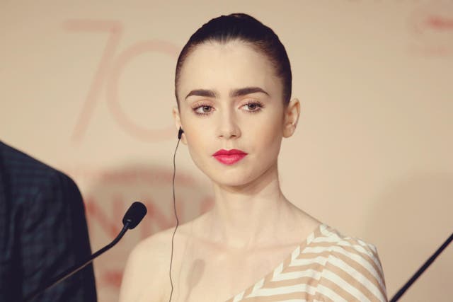 Lily Collins attends the 70th annual Cannes Film Festival