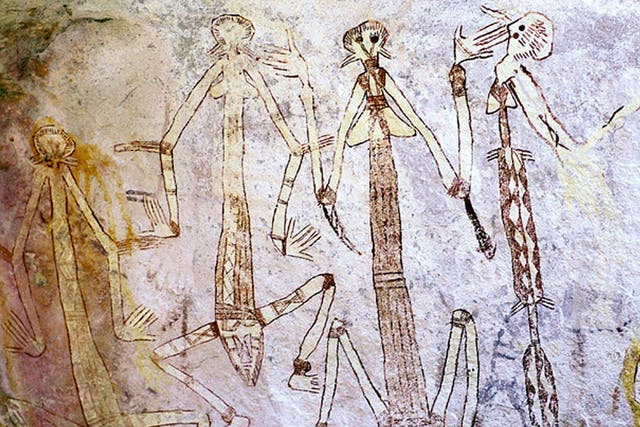 Aboriginal paintings cover cave walls in Kakadu National Park