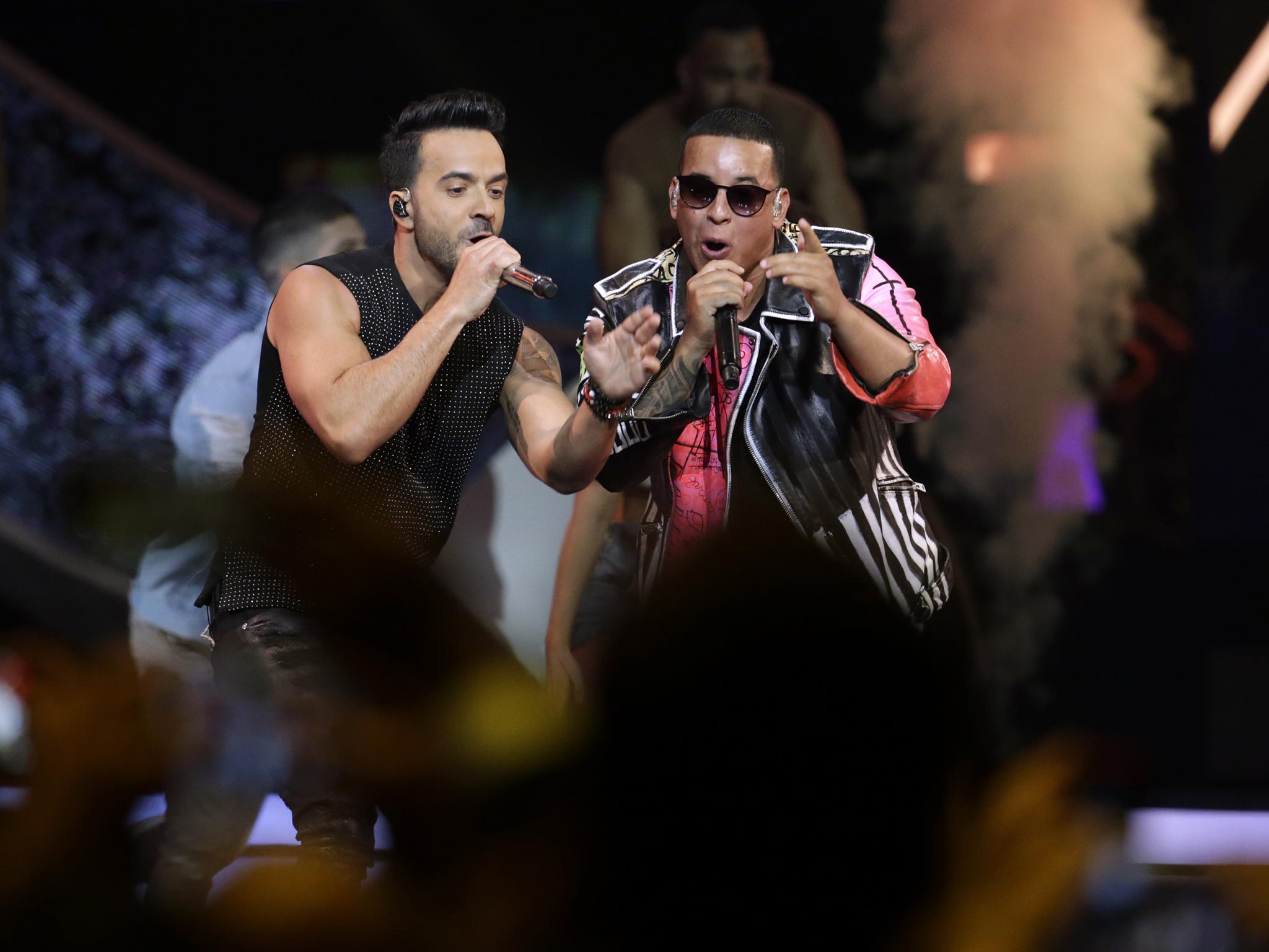 Luis Fonsi (left) and Daddy Yankee perform during the Latin Billboard Awards in Coral Gables, Florida