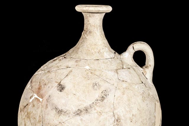 Found in a burial chamber, the smiley jug was used for a sweet sherbet-like drink and dates back to 1,700 BC