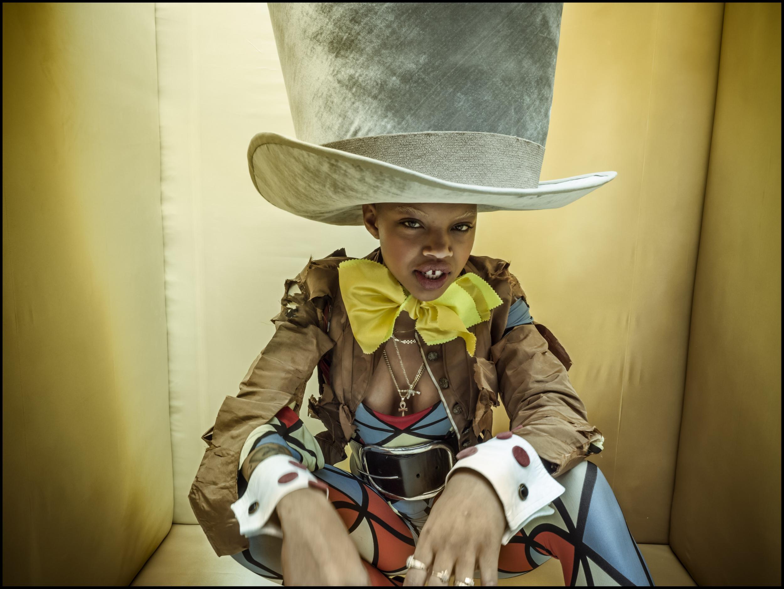 Slick Woods plays the Mad Hatter