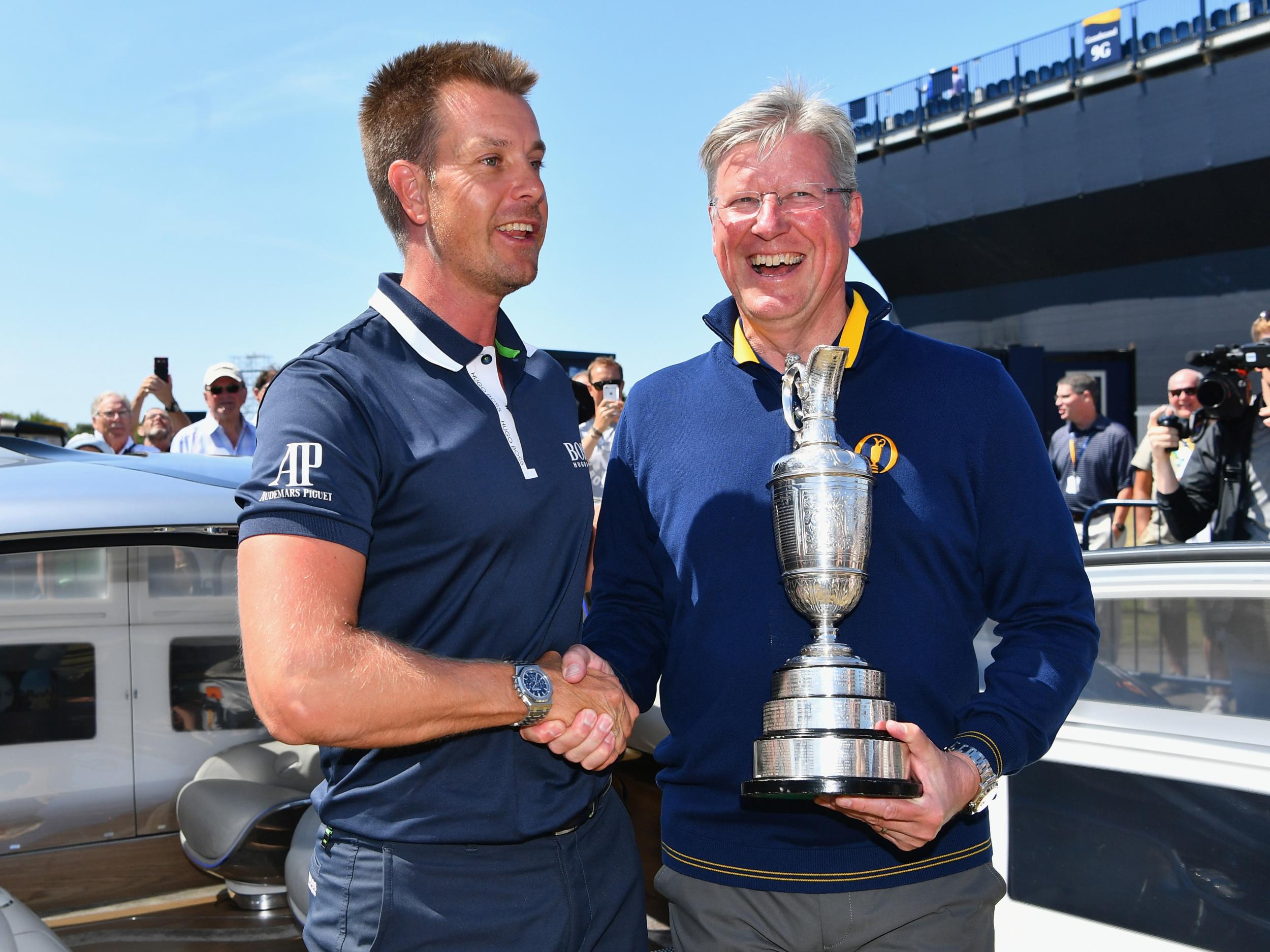 Slumbers, shown here with 2016 winner Henrik Stenson, says the Open is better off on Sky