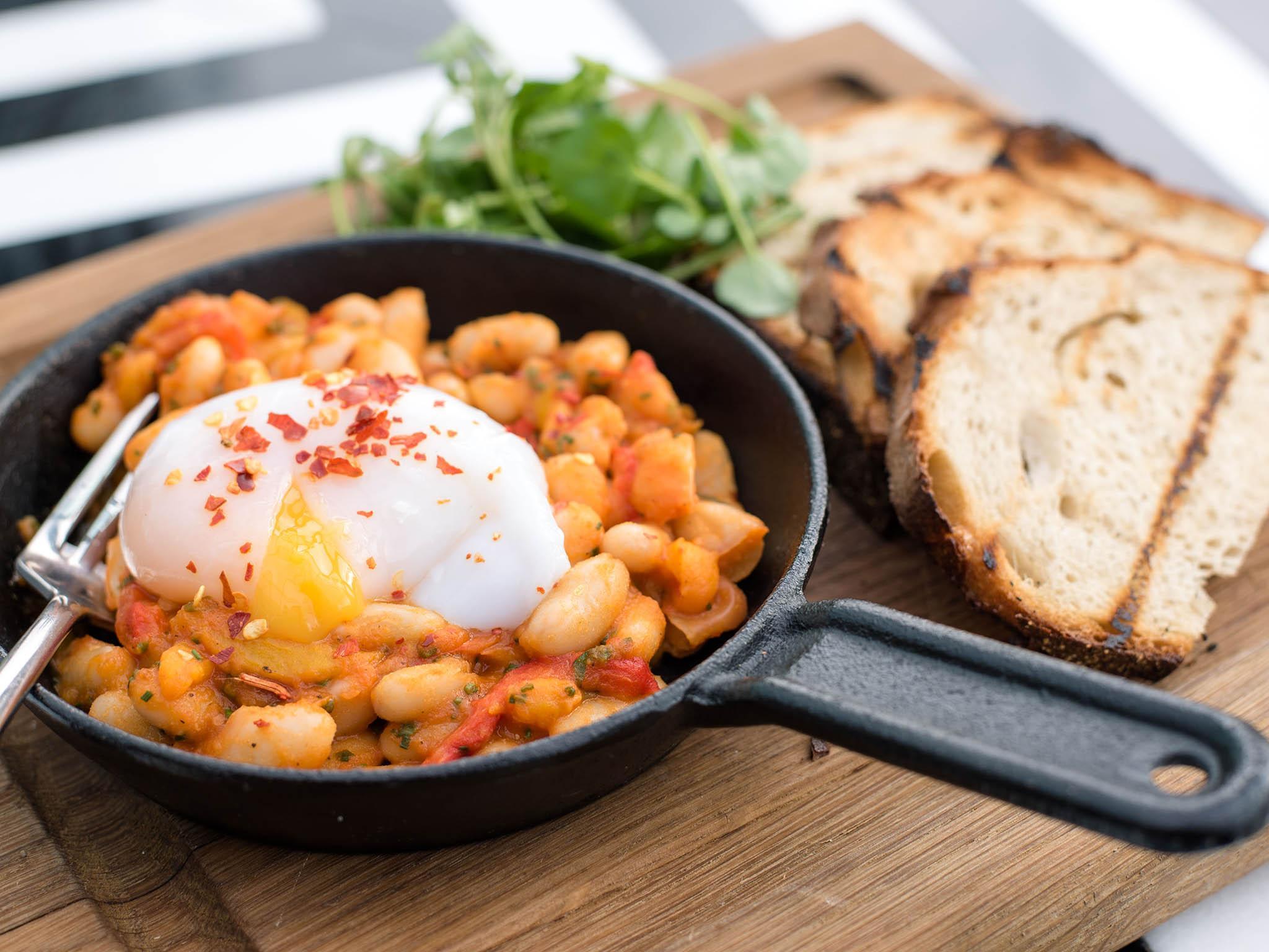 Red pepper, chilli and braised white beans, duck egg and sourdough