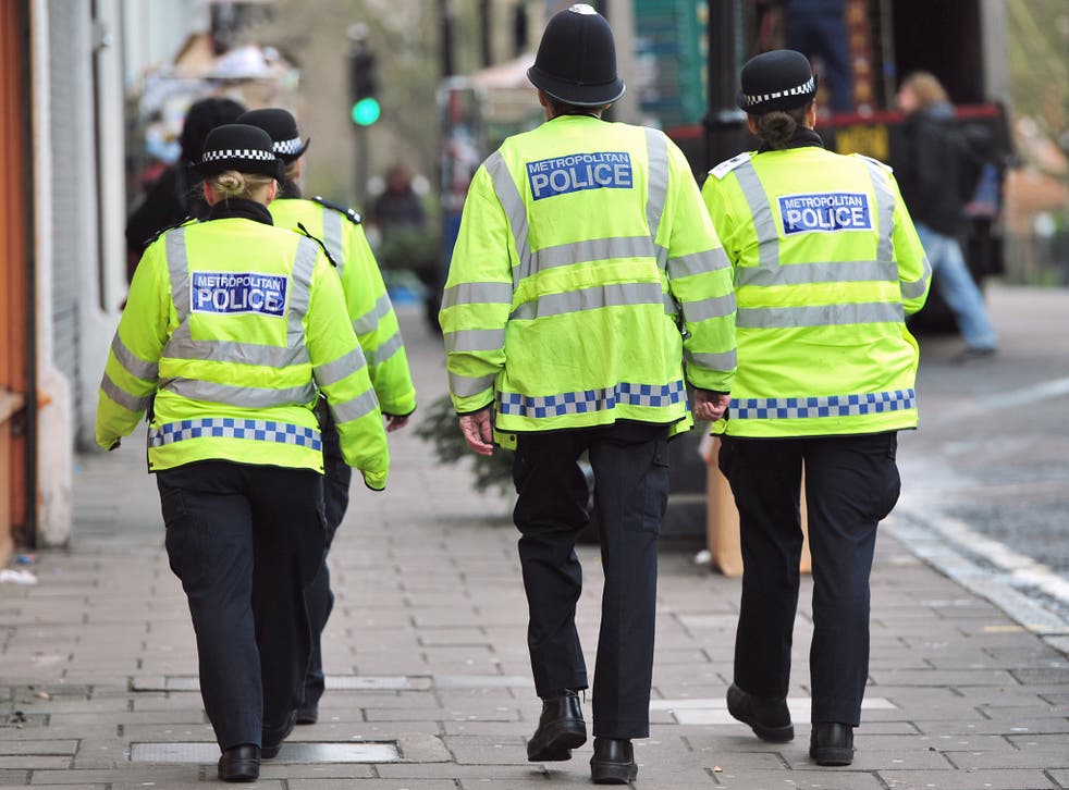 Police officers on patrol. Numbers have dwindled to their lowest point in three decades