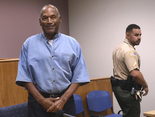 Former NFL football star OJ Simpson enters for his parole hearing at the Lovelock Correctional Center