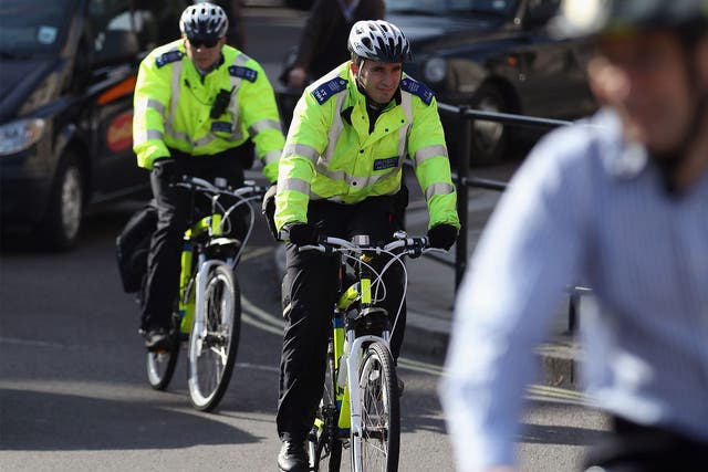 Community Support Officers cycle through central London