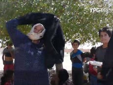 Women are burning their burqas after being freed from Isis