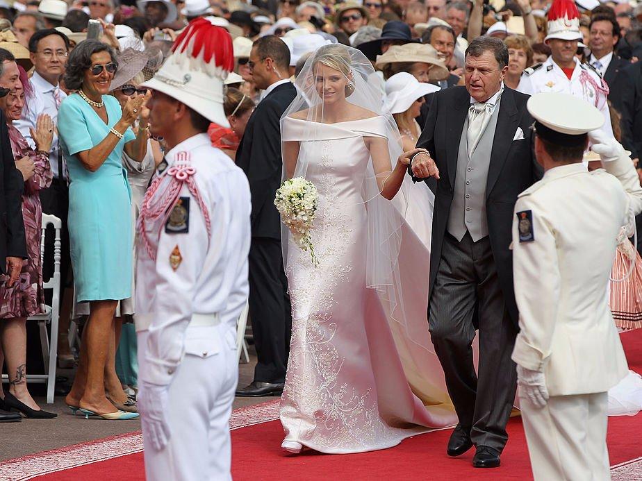 Princess Charlene of Monaco walks down the aisle to marry Prince Albert II of Monaco at the Prince's Palace in 2011.