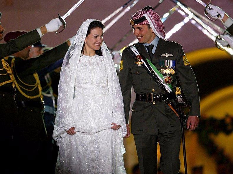 Crown Prince Hamzeh of Jordan and his bride Princess Noor smile during their wedding celebrations held in 2004 in Amman, Jordan.