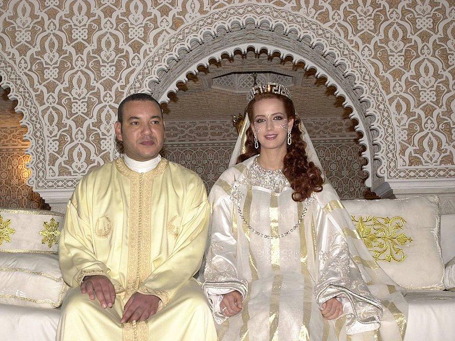 King Mohamed VI of Morocco sits with his wife Princess Lalla Salma at the royal palace in Rabat, Morocco, in 2002.