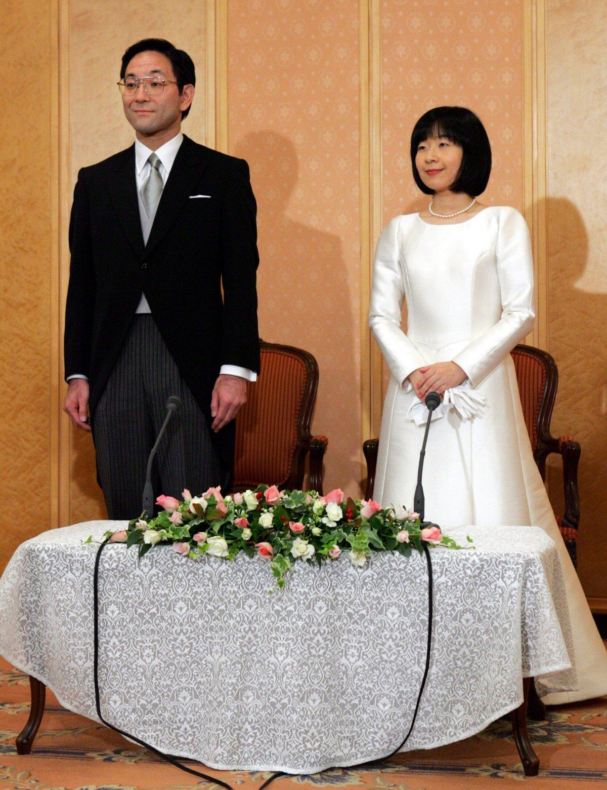 Mrs. Sayako Kuroda and Yoshiyuki Kuroda attend a news conference following their wedding ceremony in Tokyo in 2005.