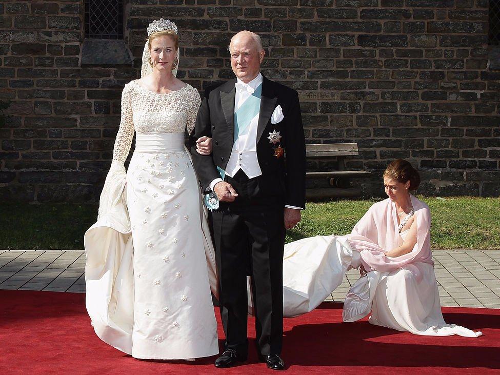 Princess Nathalie zu Sayn-Wittgenstein-Berleburg and her father arrive to her wedding to Alexander Johannsmann in 2011 in Bad Berleburg, Germany.