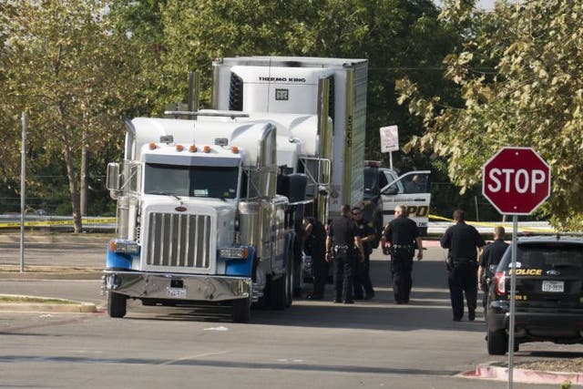 epa06105454 Officials tow a truck that was found to contain 38 suspected illegal immigrants in San Antonio, Texas, USA, 23 July 2017. Eight of the people died at the scene, seventeen were transported to area hospitals with life-threatening injuries, and thirteen people had non-life-threatening injuries, police said.  EPA/DARREN ABATE