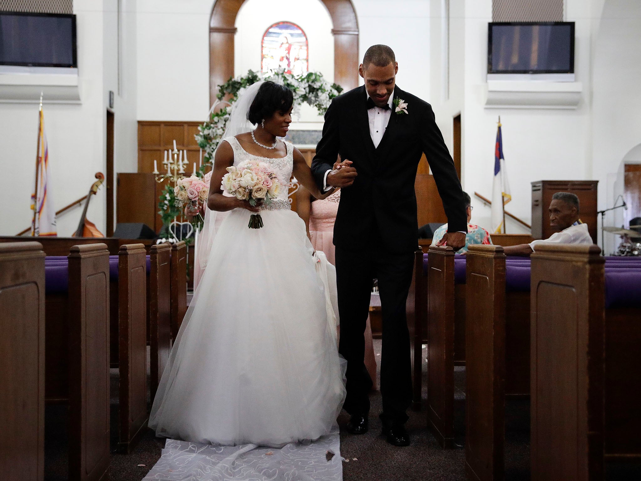 Step by step, the American athlete made good on his vow to walk his new wife Shevon Stoddart down the aisle