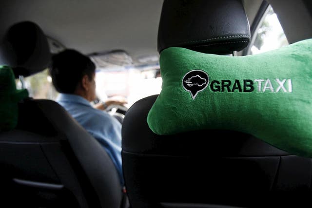 Grab Taxi, a popular ride-hailing app in Southeast Asia, builds an three-company alliance to keep out Uber