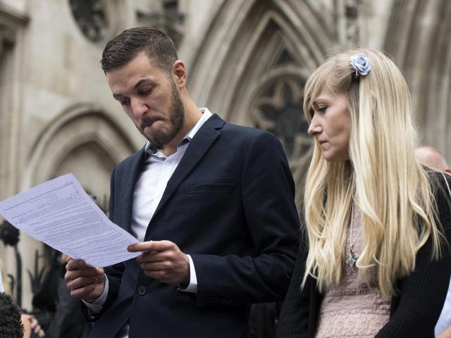 Charlie Gard's parents, Chris Gard (L) Connie Yates (R), deliver a statement outside the High Court