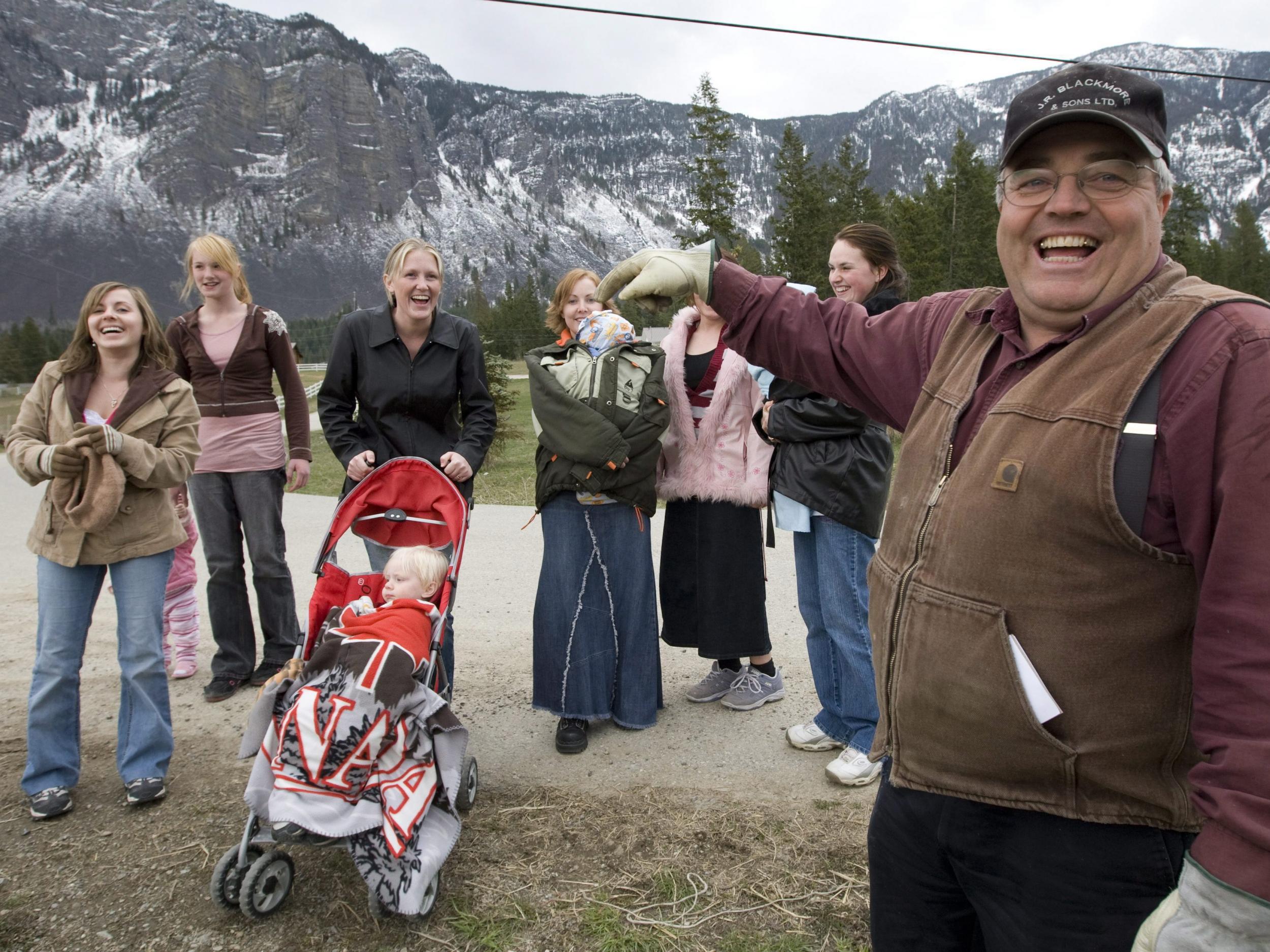 Winston Blackmore, leader of the controversial polygamous religious community of Bountiful based near Creston, British Columbia, pictured with six of his daughters and two of his grandchildren in 2008